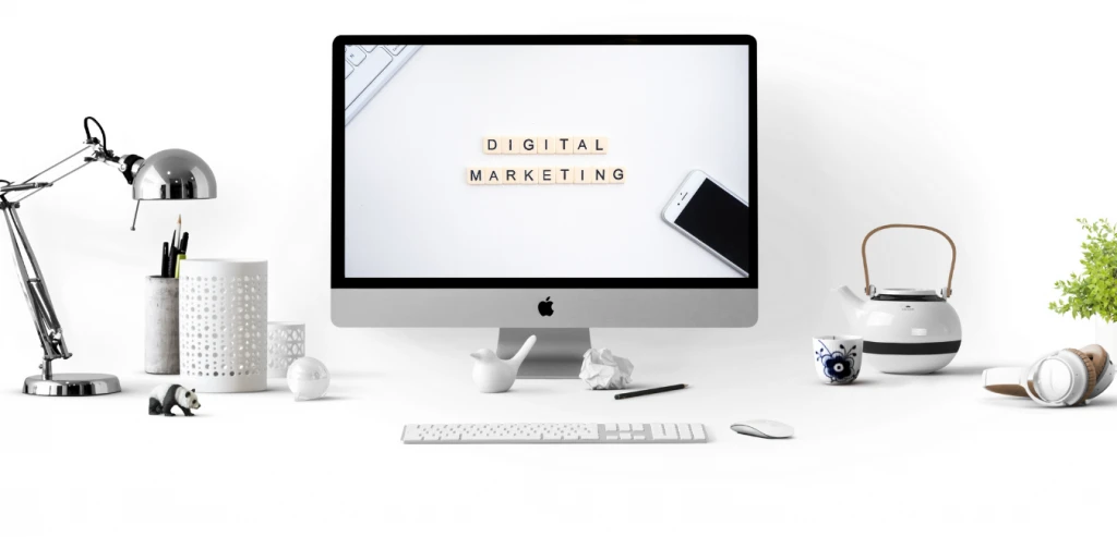 Home 2 Digital Marketing Services with Imac system, mobile, keyboard and a mouse
